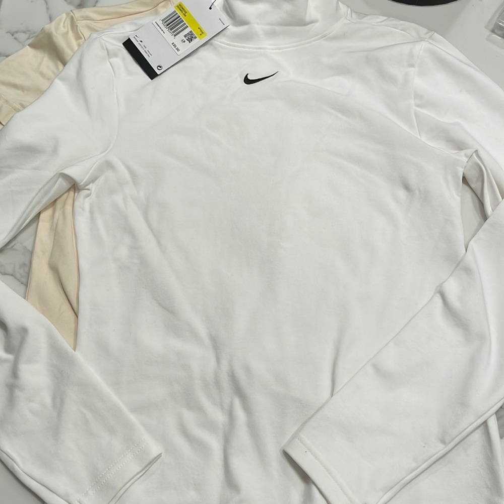 Nike, tight fit small top, long sleeve, brand new